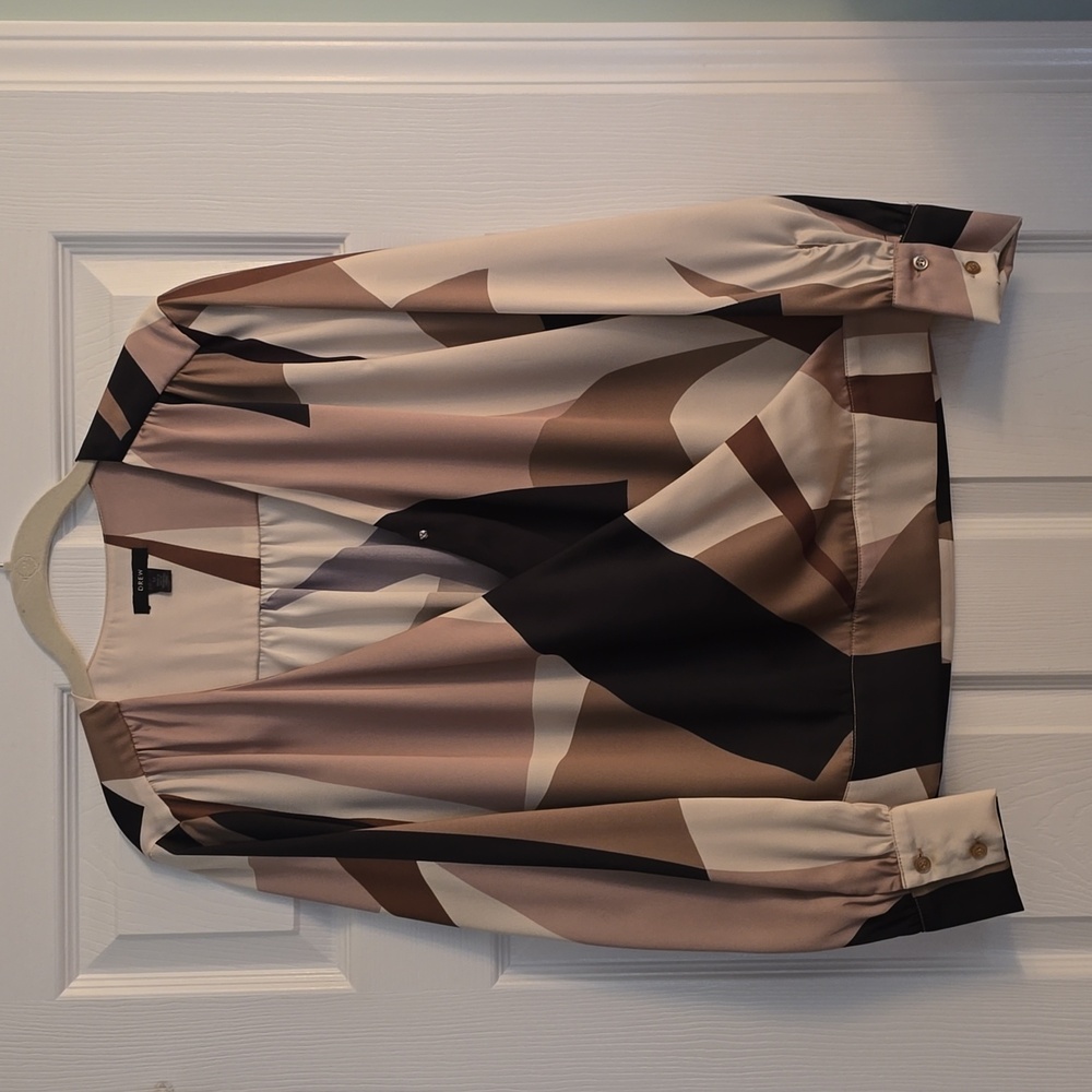 Drew silk looking blouse but is polyester,  soft and easy to wash